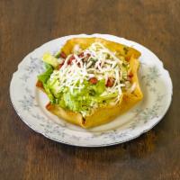 Taco Salad · Taco salad. Shredded chicken or grown beef with lettuce tomato, cheese, sour cream, and pico...