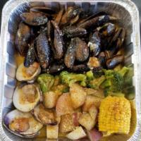 SP5. 1 lb Black Mussels, 8 Clams , 1/2 lb Shrimp Platter · 1 lb. black mussels, 8 clams and 1/2 lb. shrimp.