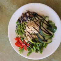 Vegan Buddah Bowl · Quinoa, cherry tomatoes, asparagus, roasted mushrooms, cucumber, avocado, and mixed greens w...