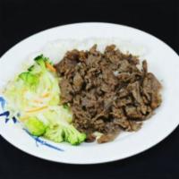 3. Beef Bulgogi · Sliced beef with veggle over steamed rice.