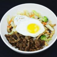11. Bibimbop · Beef, egg, mixed veggie (pan fried), over steamed rice with our special sauce.