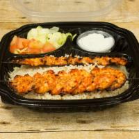 Grilled Shrimp Platter · 2 skewers. Includes rice, salad and pita.