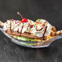 Churro Split · Comes with 3 choices of ice cream, whip cream, syrup ( choc, strawberry, and caramel), choc/...
