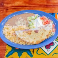 Gringa Toro Quesadilla · Grilled cheese quesadilla stuffed with your choice of meat and grilled onions and bell peppe...