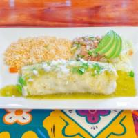 Burrito Autentico · A large flour tortilla with beans inside and your choice of meat steak, chicken, al pastor o...