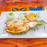 Pina Cantamar · Fish fillet, shrimp and octopus topped with special sauce and cheese. Served with rice and s...