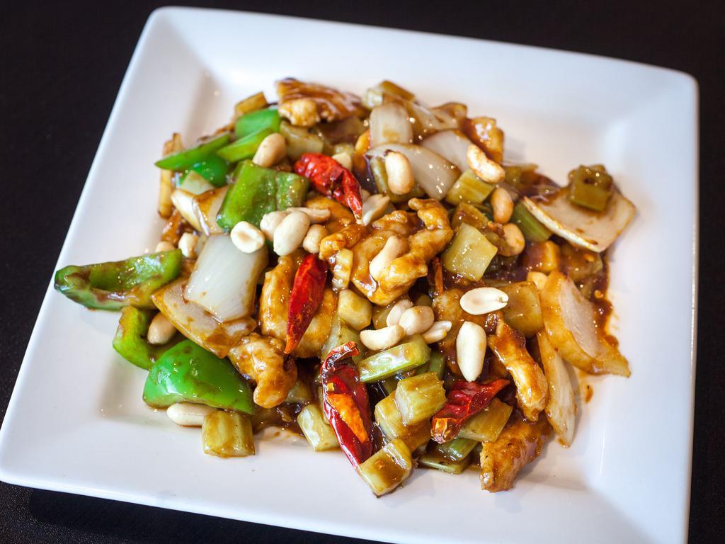 Kung Pao Chicken · Chicken stir-fried with diced celeries, green peppers, onions and chili peppers. Hot and spicy.