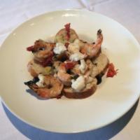 Napoli Scampi · Sauteed jumbo shrimp in extra virgin olive oil with a white wine lemon garlic sauce, sundrie...