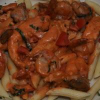Pasta Napoli · Zesty blend of tomato basil sauce with a splash of Alfredo sauce and fresh mushrooms. Served...
