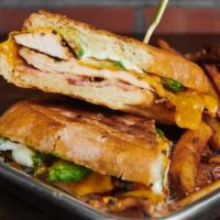 California Press · Panini pressed with grilled chicken breast, applewood smoked bacon, cheddar cheese, garlic m...