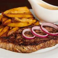 NY Strip Steak · A hand-cut Sterling Silver 12-ounce strip with hand-cut fries, and a side of peppercorn sauce