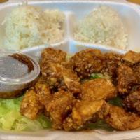 Garlic Chicken Plate · Fried boneless chicken tossed in our special house made garlic sauce. Comes with 2 scoops wh...