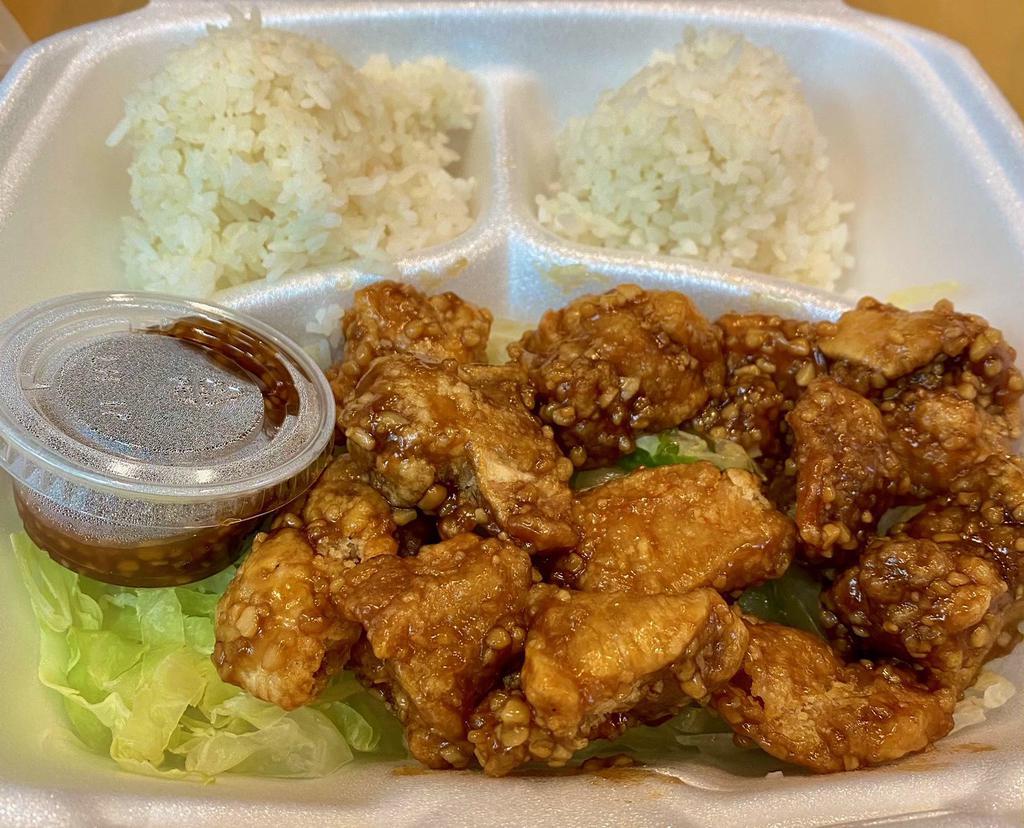 Garlic Chicken Plate · Fried boneless chicken tossed in our special house made garlic sauce. Comes with 2 scoops white rice and a side of potato mac salad.