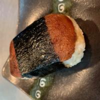 SPAM Musubi · Grilled SPAM, homemade Hawaiian sweet BBQ sauce and white rice wrapped in nori (seaweed).