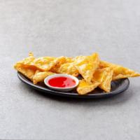 3. Fried Crab Rangoons · Fried wonton wrapper filled with crab and cream cheese.