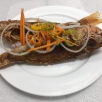 Snapper · Pan fried topped with pickled onions, carrots and peppers to your taste.
