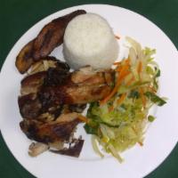 Jerk Chicken Meal · Spicy Chicken marinated in spices and grilled to perfection.