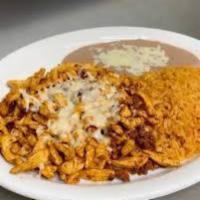 2. Chori Pollo  · Grilled chicken, chorizo, rice, beans, and cheese dip.