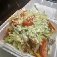 21. Nacho Supreme  · Chicken or beef. Served with bean, lettuce, tomato, sour cream and cheese.