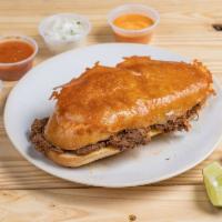 Costra Torta · Cheese - crusted torta with your choice of protein. Raw onion and cilantro on the side.