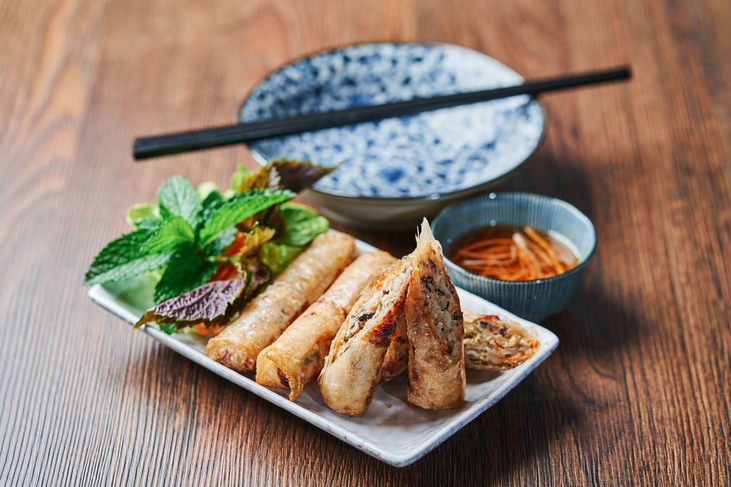 9. Spring Roll | Chả Giò · 4 Rolls. House dipping fish sauce. 
