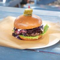 Brie and Berry Burger · 8 oz. beef patty, Brie cheese, berry compote and butter lettuce with a Dijon garlic aioli.