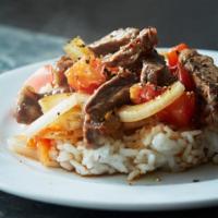 S6. Beef with Tomato Special Platter · Served over rice.