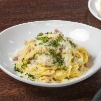 Spaghetti Carbonara · Spaghetti pasta, pancetta, egg yolk, grated pecorino Romano cheese, parsley.