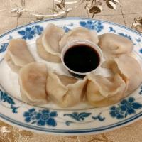 13. Steamed Pork Dumplings · Eight pieces.