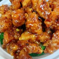 H2. General Tso's Chicken · Chunk of tender chicken meat, slightly fried and breaded, cooked with brown spicy sauce and ...