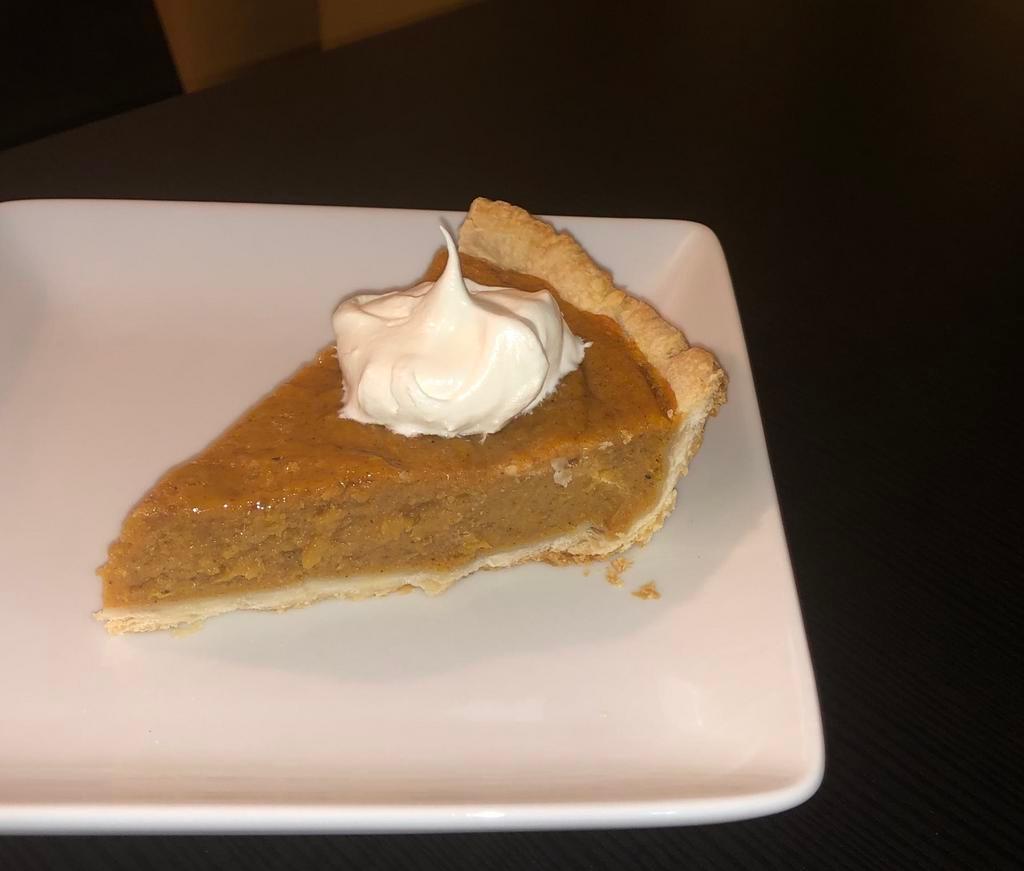 Sweet Potato Pie · Flaky pie crust with a sweet potato pie filing. Hints of cinnamon, butter and vanilla throughout. Served by the slice. Comes with a side of whip topping.