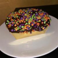 Mini Celebration Cake · Vanilla cake with chocolate buttercream icing and festive sprinkles. Cake serves about 1-2 p...