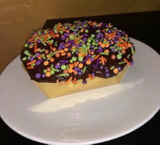 Mini Celebration Cake · Vanilla cake with chocolate buttercream icing and festive sprinkles. Cake serves about 1-2 people. 