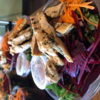 Kale Salad · Kale, carrots, beets, tomatoes, cucumbers, almonds, dried cranberries and chicken with red w...