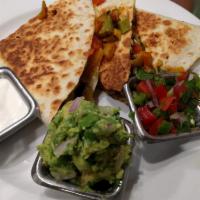 Vegetable Quesadilla · Mixed vegetables with cilantro, tomatoes & scallions. Served with guacamole, sour cream and ...