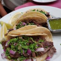 Tacos · 3 tacos with cilantro, onion, radish and green salsa 