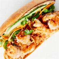 Grilled Coconut Tiger Shrimp Sandwich · Grilled Coconut Milk Marinated Tiger Shrimp. Served with cucumber, pickled carrots, cilantro...