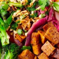 Spicy Organic Tofu Rice Bowl · Sautéed Diced Marinated Tofu with edamame beans and Roasted Vegetables. With your choice of ...