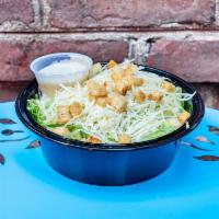 Kale Caesar Salad · Baby kale, croutons, Parmesan, creamy Parmigiano. Add fried chicken and salmon for an additi...