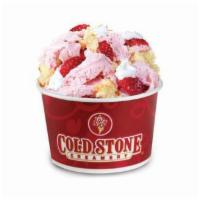 Individual Portion Surrender to Strawberry · Strawberry ice cream with strawberries, yellow cake and whipped topping.