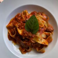 Pappardelle Bolognese · Classic veal, pork & beef ragu
