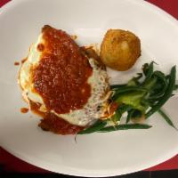 Chicken Parmigiana · Fresh mozzarella, tomato sauce