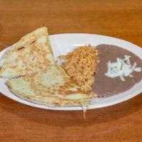 Quesadilla · Served with rice and beans. 