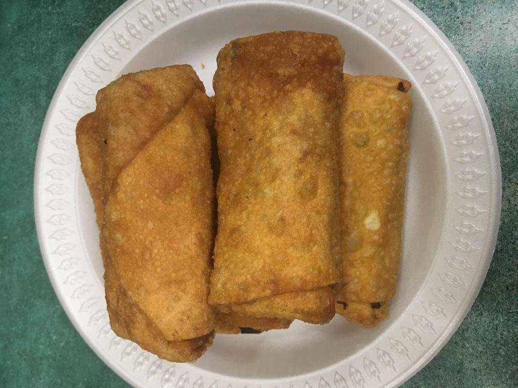 1. 1 Egg Roll · Crispy dough filled with minced vegetables.