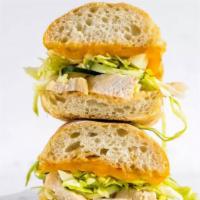 Chipotle Chicken Sandwich · Grilled chicken, homemade chipotle mayo, melted cheese, lime slaw, sliced cucumbers and cila...
