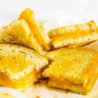 Kids Grilled Cheese · Hot sandwich filled with American Cheese that has been pan cooked or grilled. Available on s...