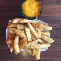 Steak Fries · Thick-cut French Fries.  Optional side of Cheddar Cheese