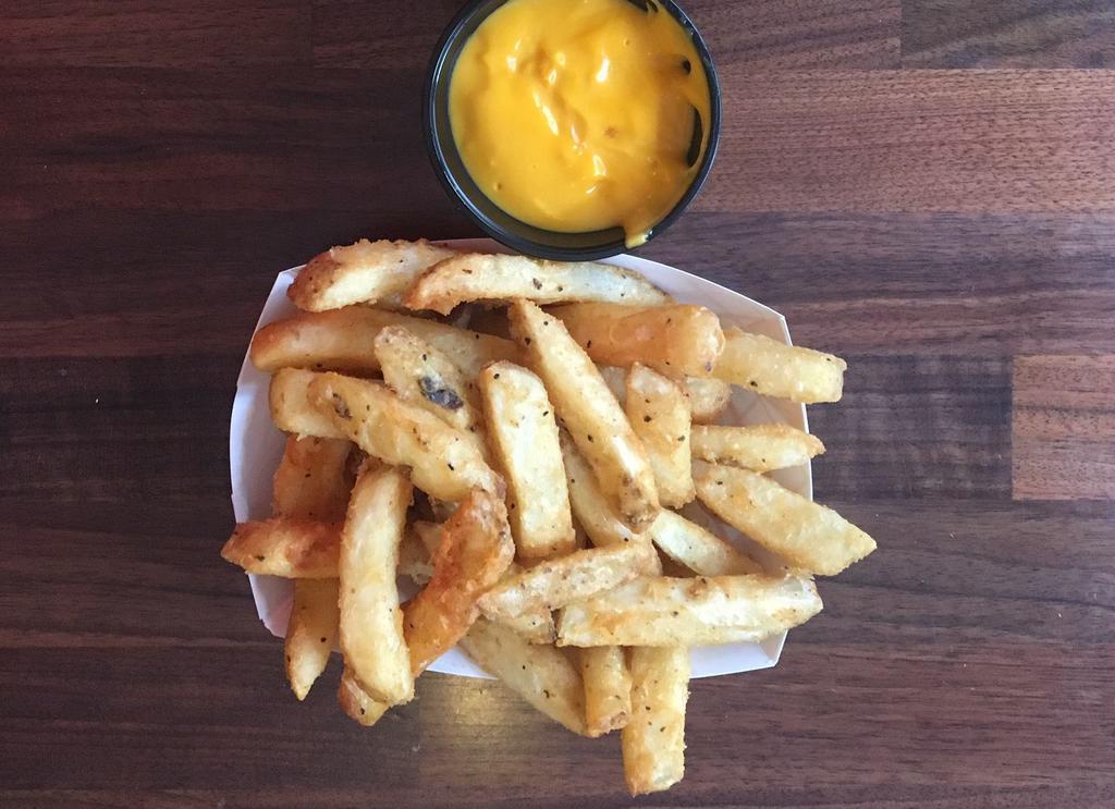 Steak Fries · Thick-cut French Fries.  Optional side of Cheddar Cheese