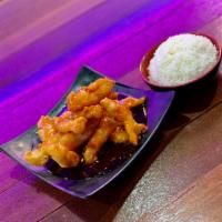 Sweet and Sour Chicken · Served with steamed rice.