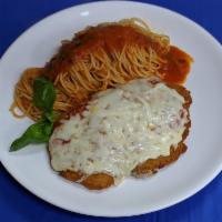 Chicken Parmesan over Spaghetti · With tomato sauce.